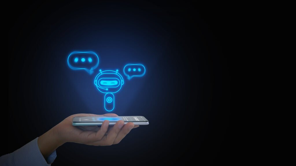 A hand holding a phone with a floating chatbot icon.